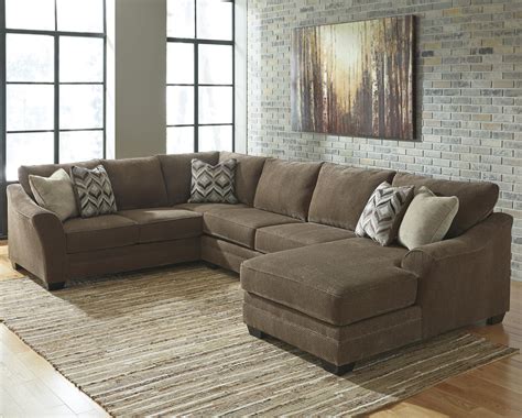Chic down to the details with black and white striped piping and round back pillows. Benchcraft Justyna Contemporary 3-Piece Sectional with ...