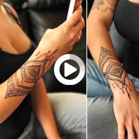 The lotus bloom in this mandala tattoo looks quite charming and appears as if it's blossoming out of the arm. Pin on ButterFly Wrist Tattoo in 2020 | Mandala wrist ...