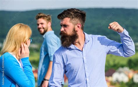 Husband Strictly Watching His Wife Looking At Another Guy While Walk Violence Concept Man With