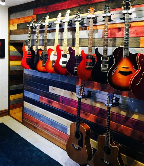 Guitar hanging system used in home for guitar storage and display | Guitar hanger, Guitar wall ...