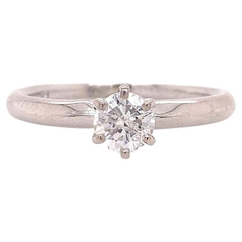 Six Prong Classic Engagement Ring With Diamond Pave With Round Center