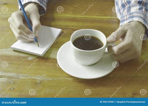 Hand Writing On Book While Drinking Black Coffee Stock Photo Image Of