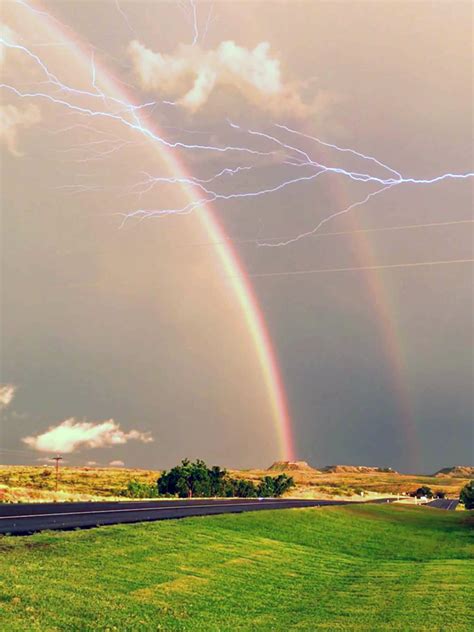 Heres A Stunning Photo Of A Double Rainbow And A Lightning Strike You