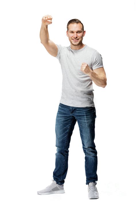 Handsome Man Clenching His Fists Cheering Gesture Photograph By