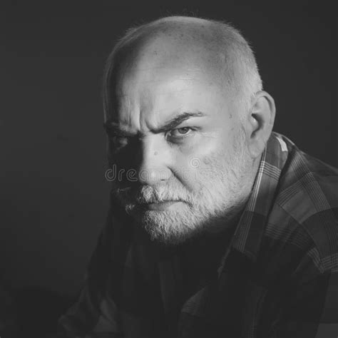 Older Man With A Serious Look Man With Grey Beard Frown Brows On