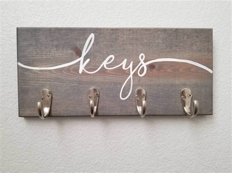 This combination mail and key holder offers organization and a touch of rustic farmhouse charm all at the same time. 40 Unique Wall Key Holders for Your Home's Entryway | Rina Watt Blogger - Home Decor, DIY and ...