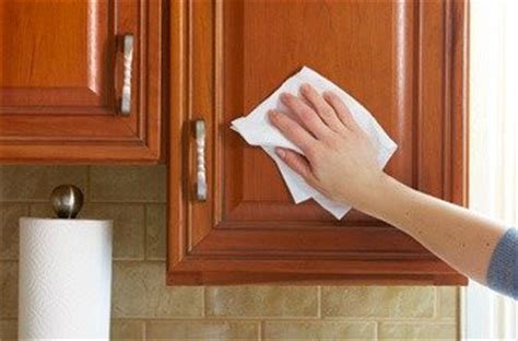 That means, on the top of it a greasy layer builds up regularly. Cleaning Kitchen Cabinets