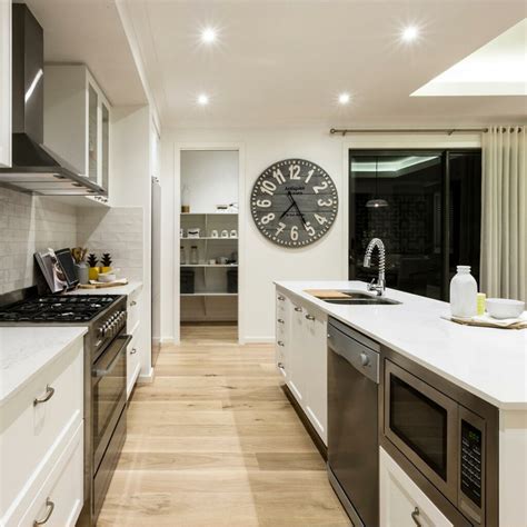 Latest small kitchen designs in india: 20 Beautiful Parallel Kitchen Designs For Home | Design Cafe