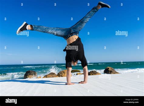 Handstand At The Beach Stock Photo Alamy