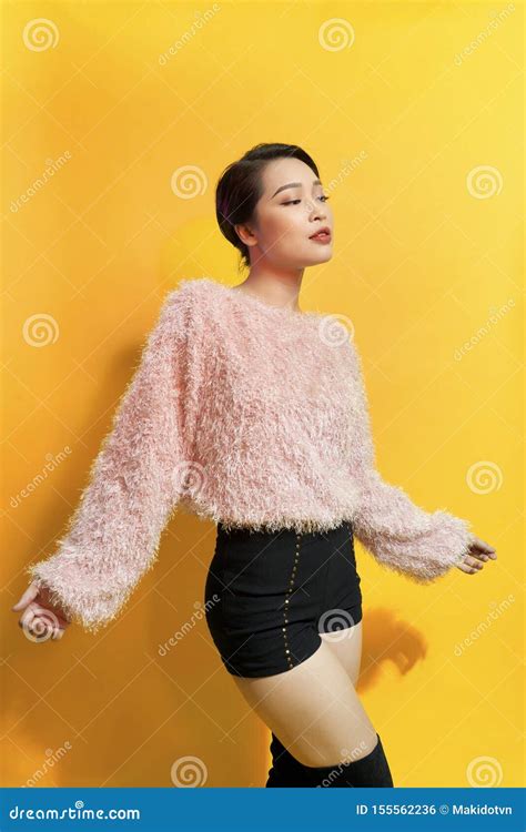 Short Haired Girl In Fashionable Dancing Young Playful Female Model In