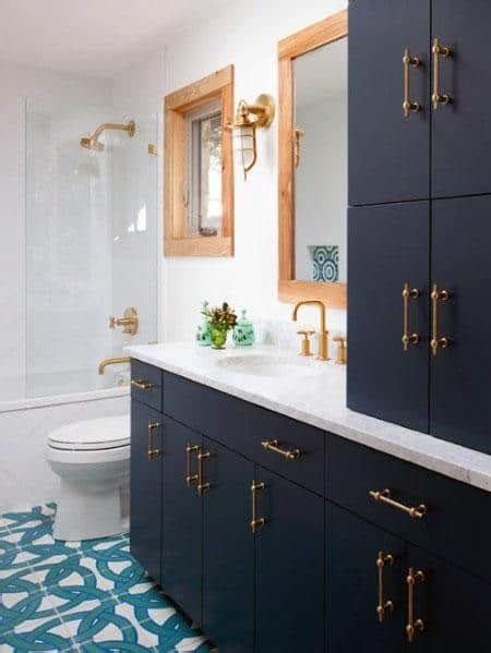 To enhance the blue theme, a swath of pale blue on the ceiling above the tub creates a blue sky effect for a relaxing soak. Top 50 Best Blue Bathroom Ideas - Navy Themed Interior Designs