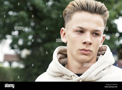 Head And Shoulders Portrait Of Serious Teenage Boy Stock Photo Alamy