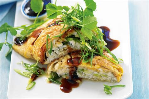 This cheesy omelette is stuffed with buttery garlic mushrooms. Asian crab omelette - Recipes - delicious.com.au
