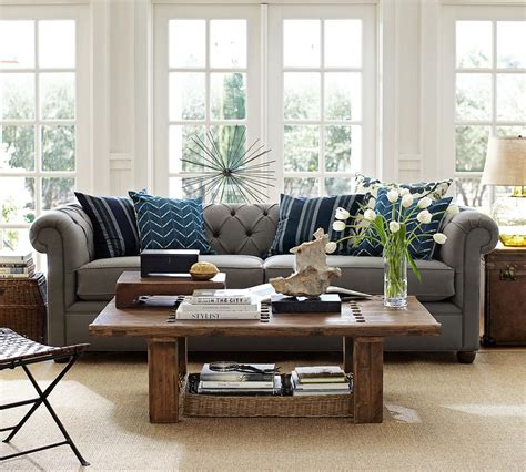 Gray Sofa With Blue Accent Pillows And Natural Fiber Rug Refresh And