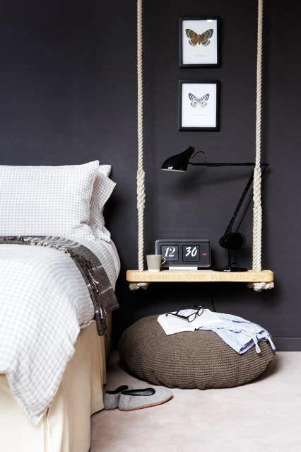 A Hanging Bedside Table Adds A Modern Vibe To This Bedroom Bedside