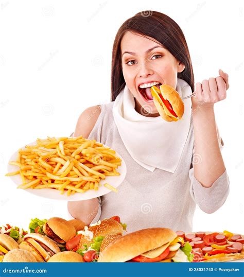 Woman eating fast food. stock image. Image of nutrition - 28031743