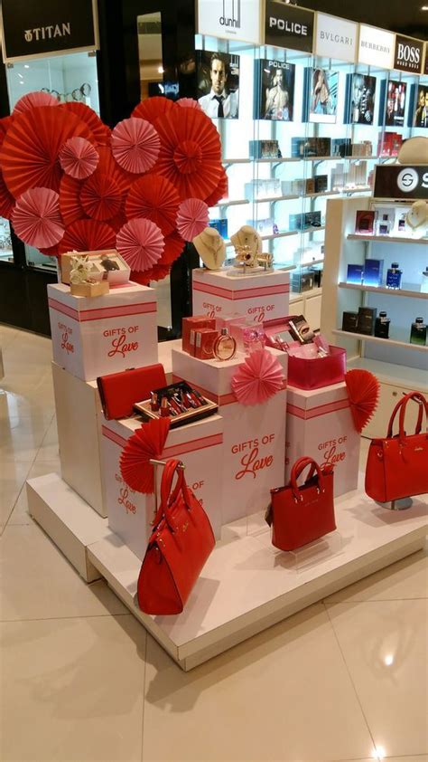 Red Bags And Purses Are On Display In A Store