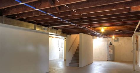 When it comes to finishing the basement ceiling, most homeowners think of two options, drywall or dropped ceiling. Ideas For Exposed Ceiling Unfinished Basement Lighting ...