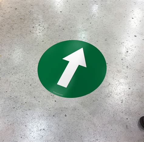 Green Directional Arrow Floor Sign Stop