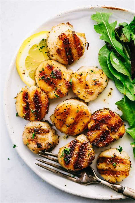 Here, these succulent shellfish are sautéed with cherry tomatoes. Grilled Lemon Garlic Scallops | The Recipe Critic - Lose Belly Fat