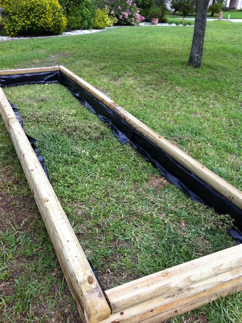 How To Build A Raised Garden Bed With Landscape Timbers ...
