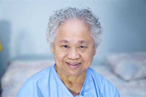 Asian Senior Or Elderly Old Lady Woman Patient Smile Bright Face While