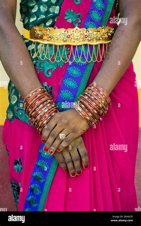 Rural Indian Village Bride Dressed In Colourful Sari And Gold Jewelry