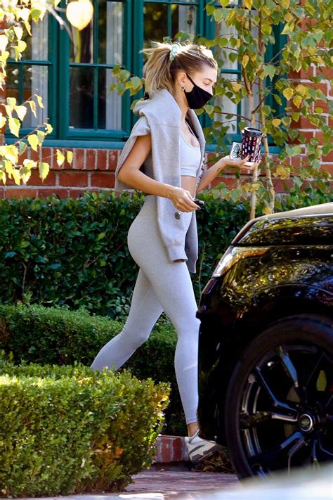 Hailey Bieber Shows Off Her Toned Figure In Grey Sports Bra And Leggings As She Leaves A Private