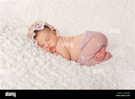 Sleeping Newborn Baby Girl Stock Photo Alamy
