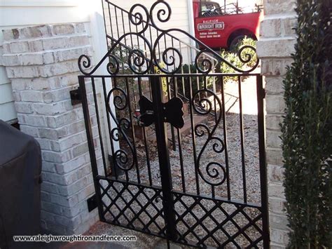 We design and create wrought iron gates, railings, and fences. Greensboro NC wrought iron driveway gate fabricator ...