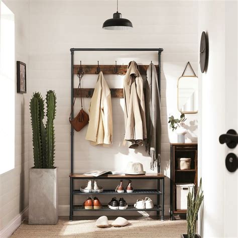 It features five staggered hooks connected to the rubberwood stem, each with a weight capacity of 11 pounds, to keep your clothes, bags, and other items conveniently organized. VASAGLE Industrial Coat Rack with Storage Bench, Pipe ...