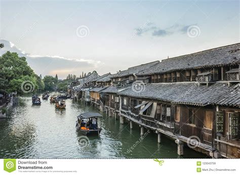 Houses And Boats On River At Dusk In Wuzhen China Stock Image Image