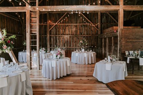 Discover a rustic wedding ceremony in a barn and a tent reception at a the bride's parents' farm in ohio. The Barn at Wolf Creek | Reception Venues - Copley, OH