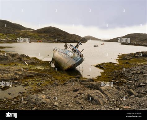 Abandoned Fishing Boat On The Offshore Island Of Itilleq West Greenland