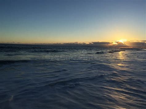 Pacific Ocean Waves At Beach In Kekaha During Sunset On Kauai Island