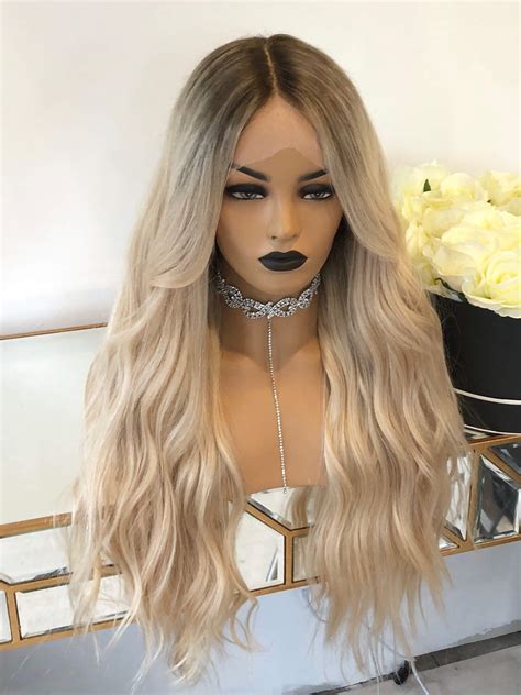 All our wigs are made of heat resistance fibre and can be styled by hot tools. Ombre blonde short Bob human hair wigs- edw2058