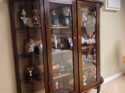 Vintage brass glass curio display cabinet 6 sides 3 shelf table top collectibles stylish curio cabinet mounted on brass frame and covered with glass. Curved Glass Curio Display Cabinet | Collectors Weekly