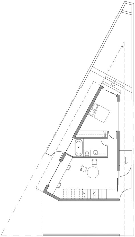 An open space the size of the lot configures floor 1. Gallery of Triangle House / Robeson Architects - 23