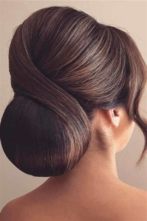 32 chignon bun hairstyles to get a stylish look elegant wedding hair chignon hair wedding