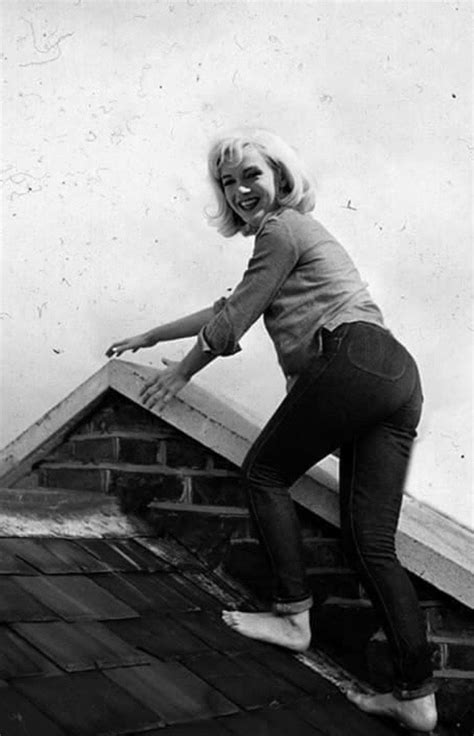 Fantasy Artwork Of A Barefoot Marilyn Climbing The Roof Of A House