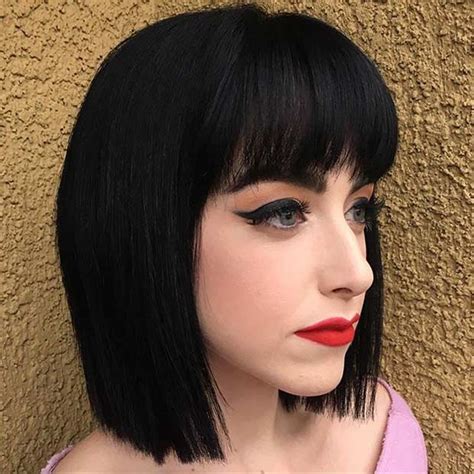 Long layered blonde hair with bangs for a fabulous hairstyle for a wedding, form a thick low braided ponytail with long layered hair. 2017 Lob Haircuts - Long Bob Hairstyles - Fashion Trend Seeker