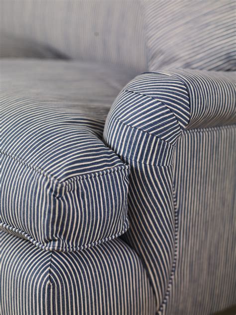 Bedroom with blue striped chair. blue stripe roll arm … | Blue and white fabric, Striped ...