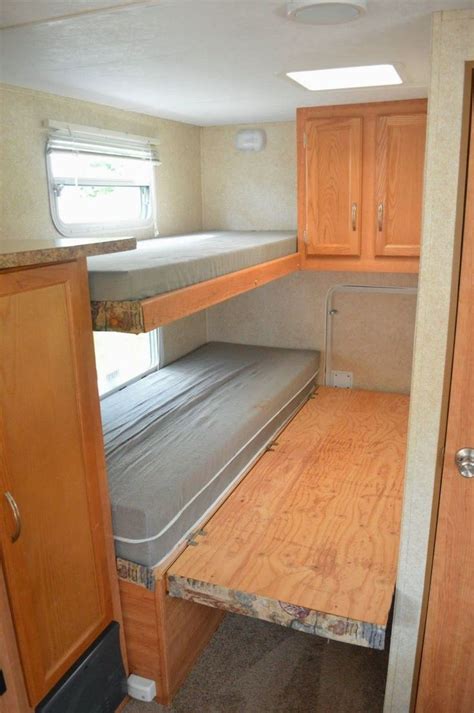 corner rv bunk room for rv inspiration add some hinges and a fold out wooden bed frame to the