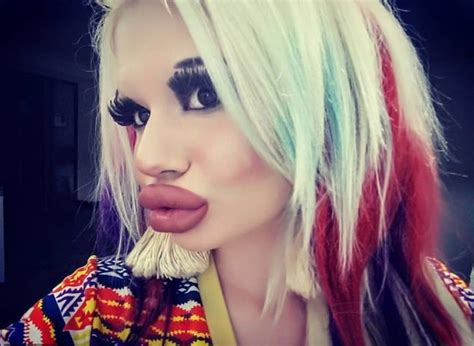 22 year old woman who spent thousands to triple the size of her lips says it s not enough