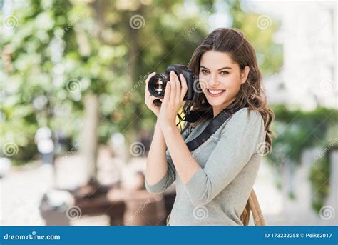 Woman Professional Photographer With Dslr Camera Outdoors Portrait
