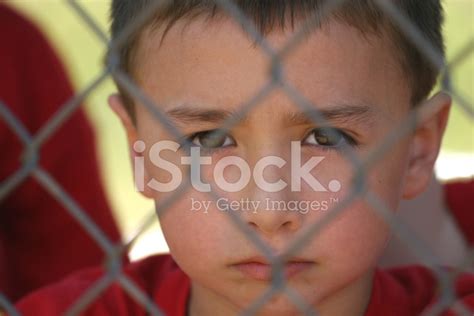Boy Behind Fence Stock Photo | Royalty-Free | FreeImages