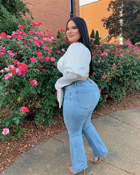 erika aguilera 🦋 on instagram “ ymijeans in a field of roses be a wildflower 🌷🌻🌷 ymijeans