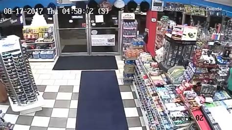 Shocking Moment Brave Store Clerk Fights Off Ax Wielding Robbers
