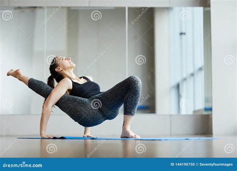 Professional Yogis Doing Modified Yoga Crab Pose Stock Photo Image Of