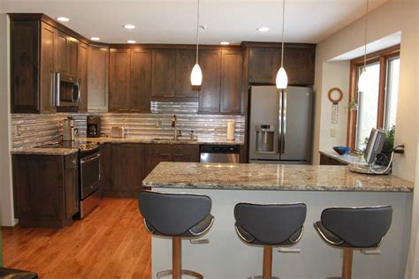 White kitchen cabinets with black slate appliances. Slate Countertops For Your Bathroom and Kitchen in 2019 ...